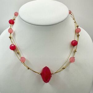 Pink and gold tone wire floating bead necklace